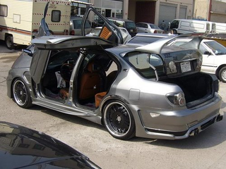 Illustration for article titled World's Most Hideous Nissan Maxima Found In Kuwait